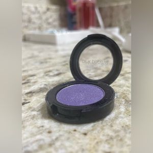 Pink Papaya sparkly purple eye shadow